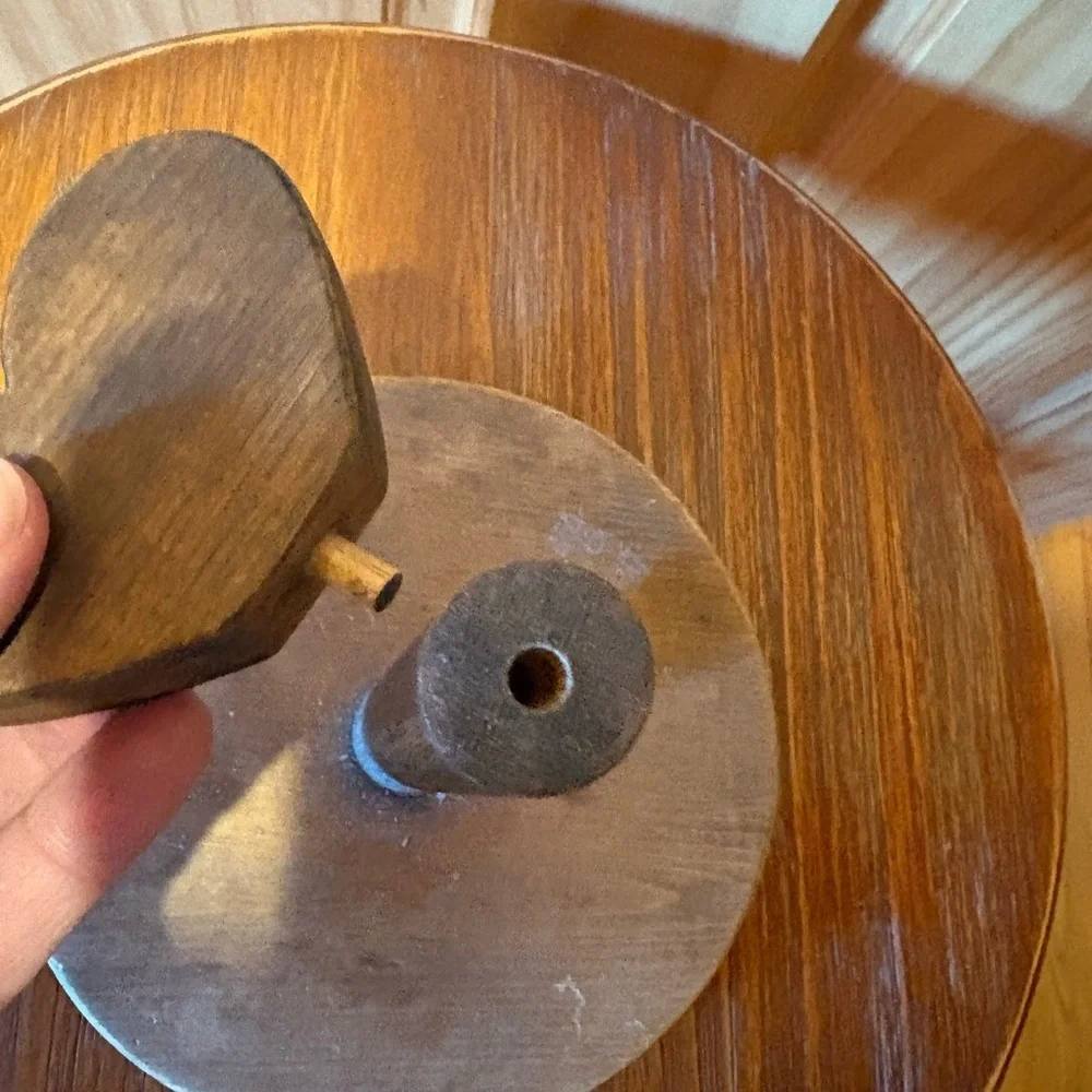 Vintage-style handmade wooden toilet tissue holder with painted geese